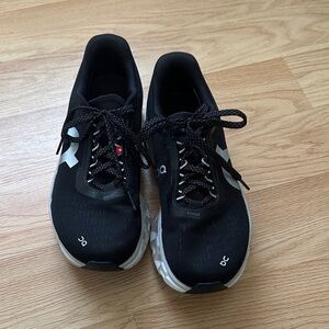 On Running womens Black with White Accents Athletic Sneakers
